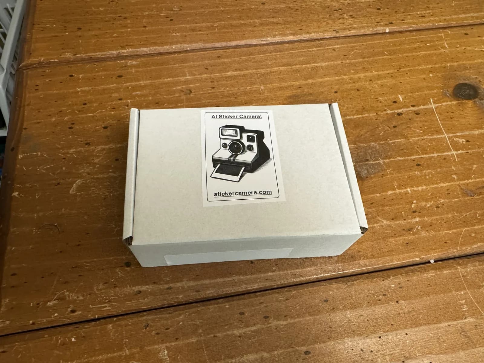 Small package personalized with a Sticker Camera label